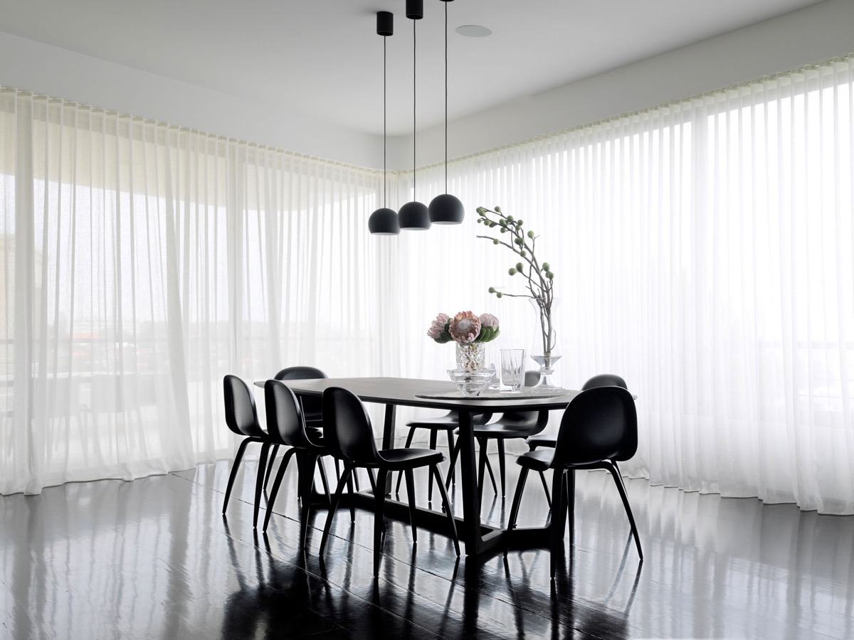 polished-floor-chiffon-curtains-monochrome-dining-room 