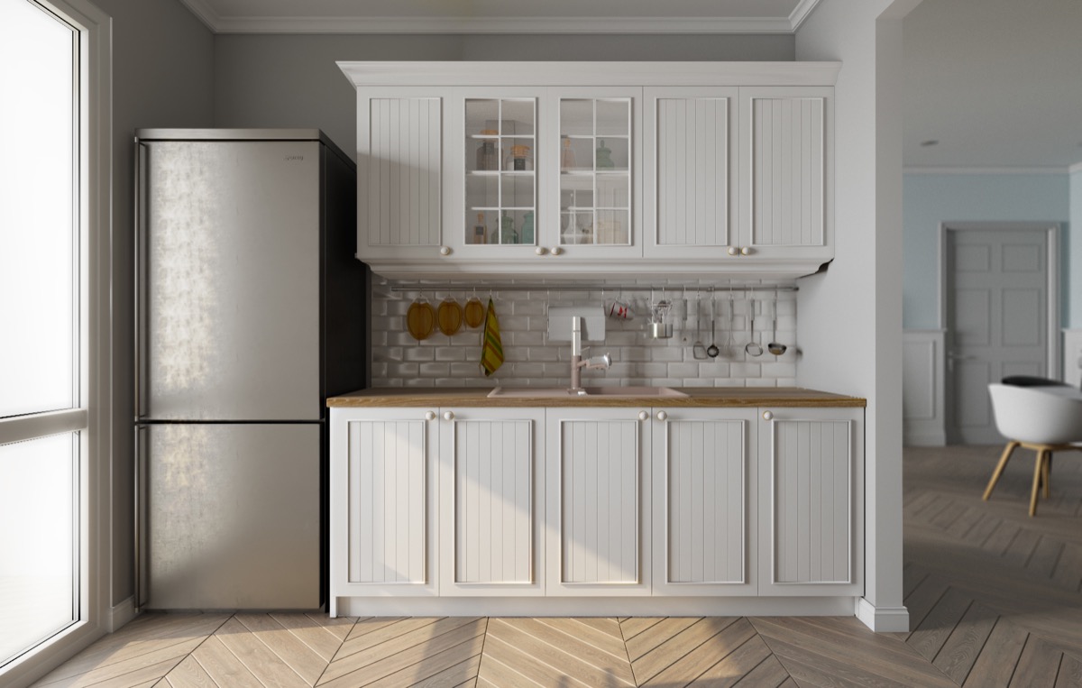 French-cabinets-chrome-fridge-Scandinavian-kitchen