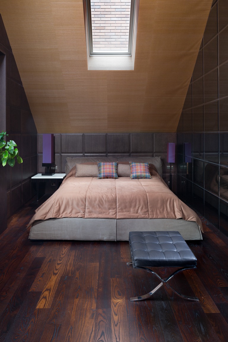 Attic bedroom design with classic theme