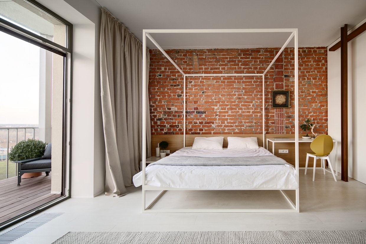 Brick bedroom with private balcony