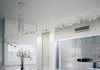 White apartment interior design with mirrored water feature
