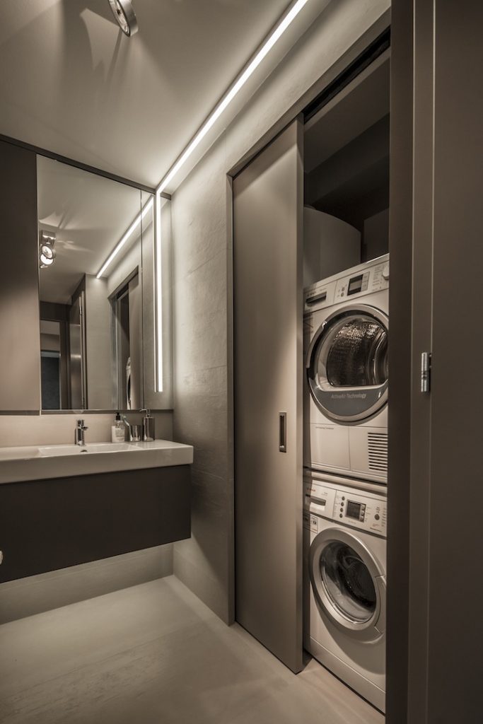 View of Industrial Apartment Design With Dark Interior Style - RooHome