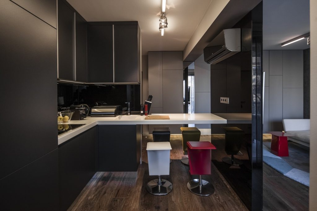View of Industrial Apartment Design With Dark Interior Style - RooHome