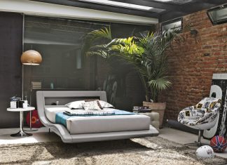 lush-jungle-bedroom-with-exposed-brick