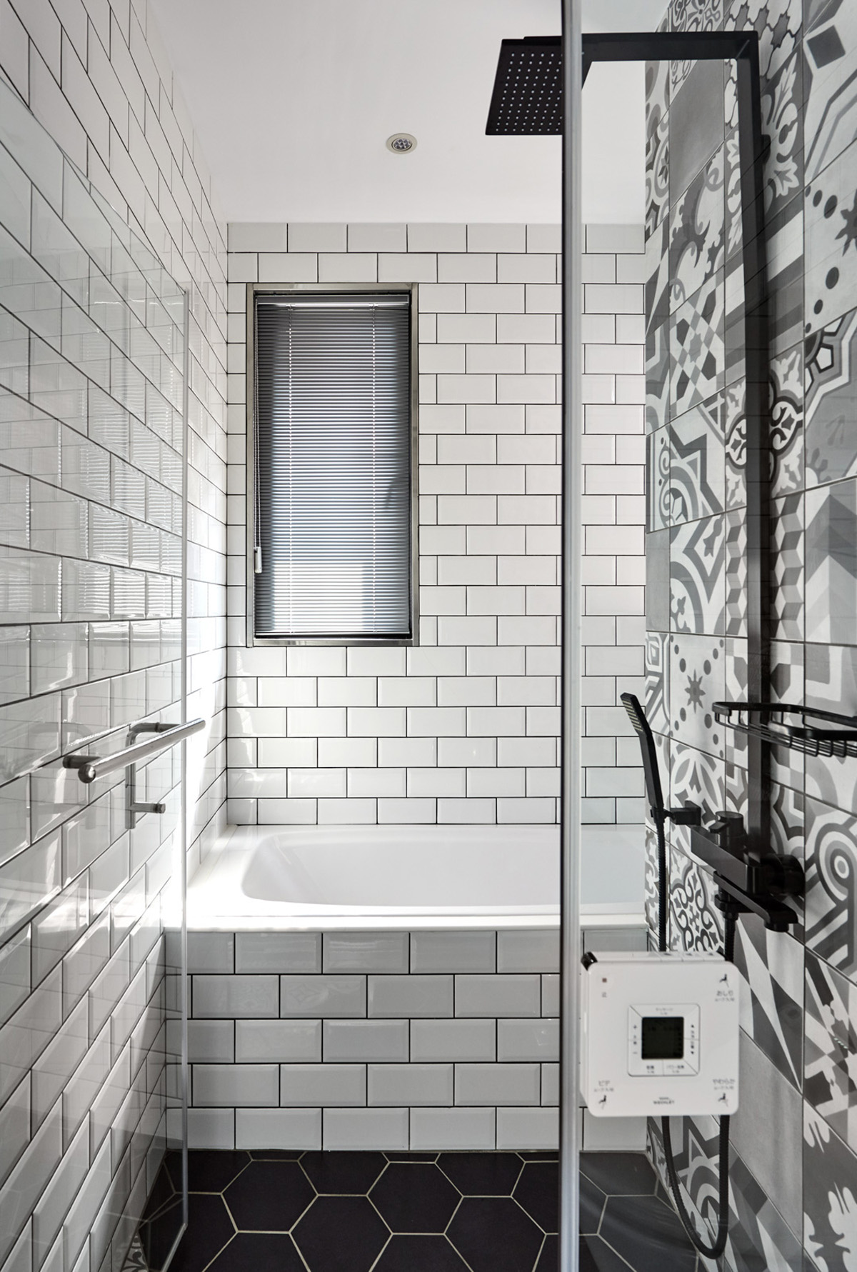 small bathroom with unique tile patterned