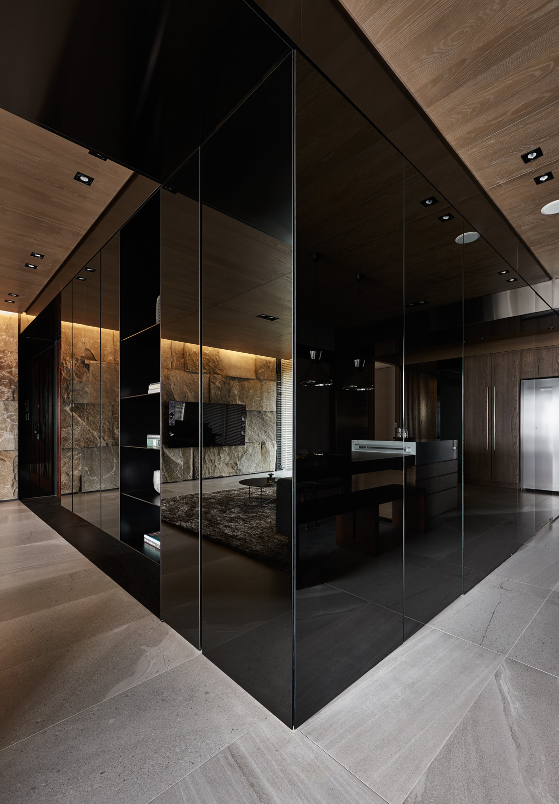 marble-floor-black-acrylic-cabinetry-sophisticated-dark-interior