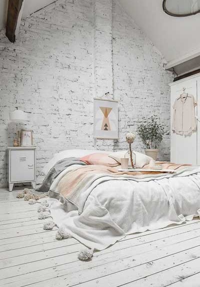 white brick wall bedroom