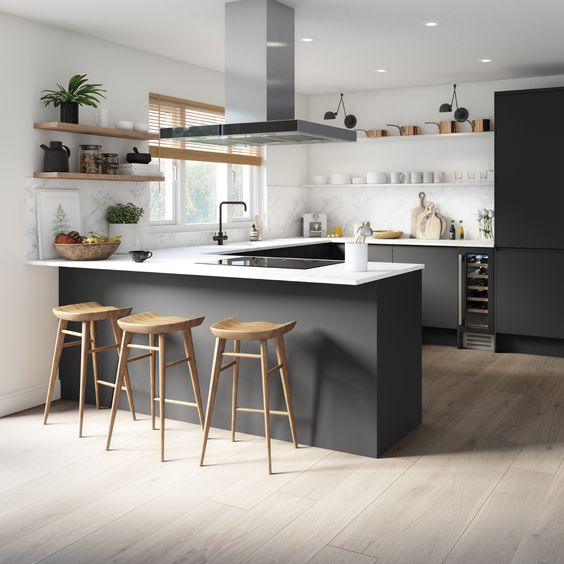bright monochrome kitchen with black touch on several spots