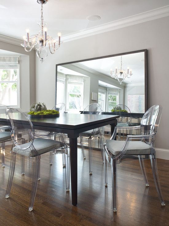 beautiful dining room with big mirror