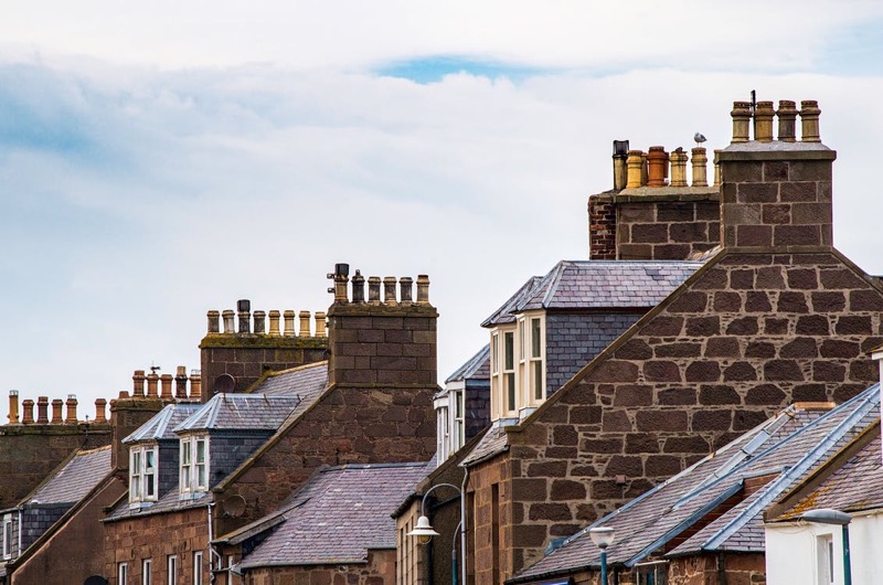 Multiple homes with chimneys 