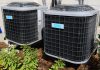 A picture of an AC unit that needs some maintenance done before the summer heat hits.